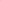 Light green scarf rolled up on a white surface with a wooden frame.